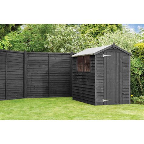 tudor black oak fence shed.